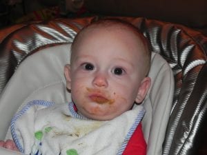 Enjoying homemade baby food at 6 months