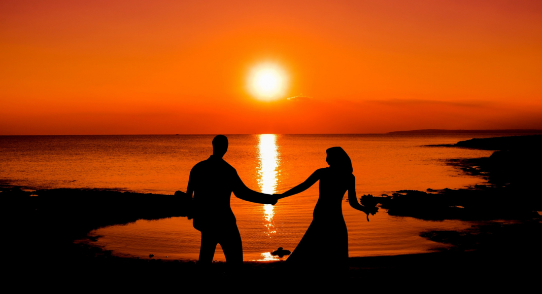 Marriage + Relationships Picture Showing Couple at Sunset