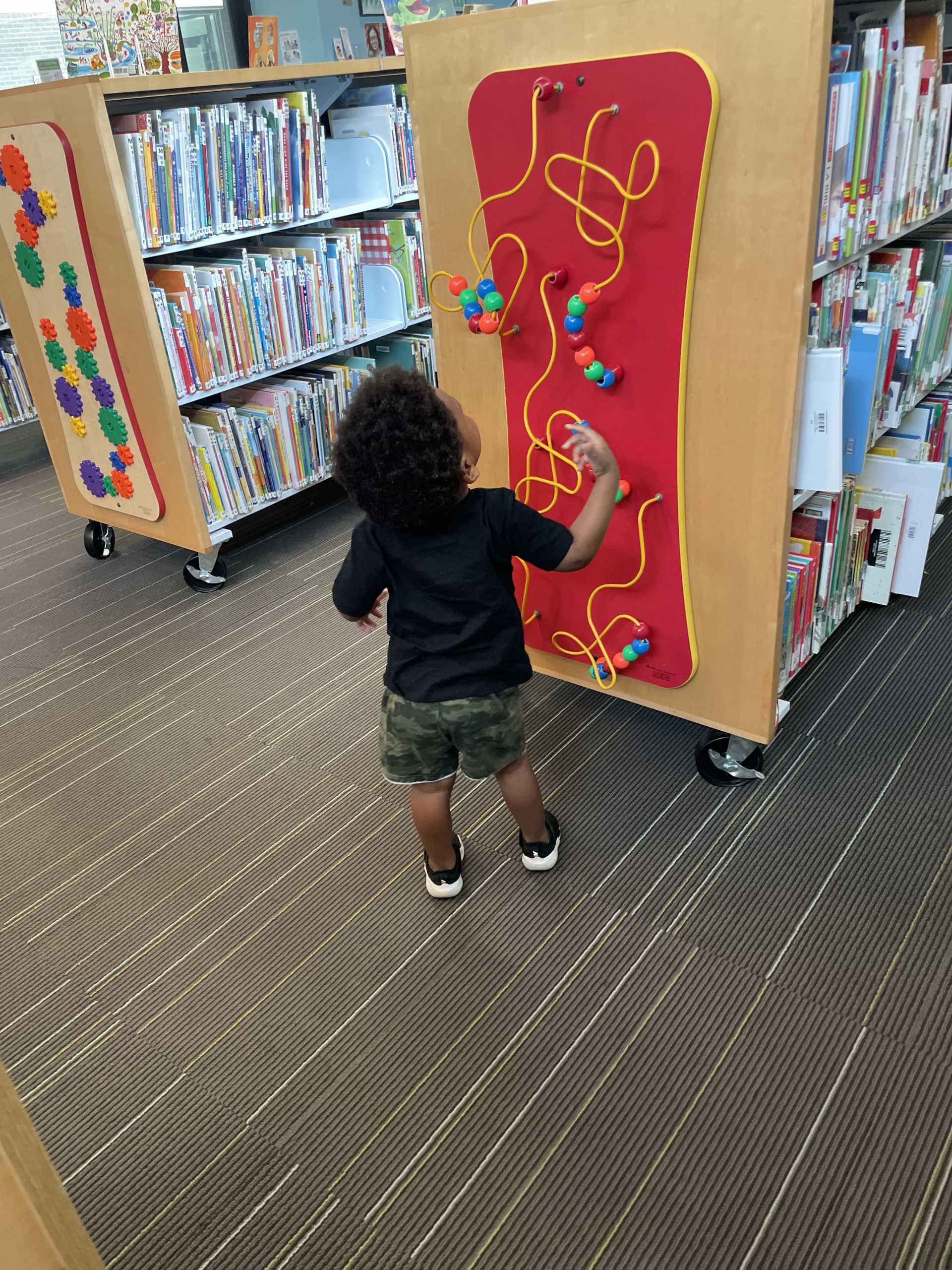 Checking out the other activities at the library.