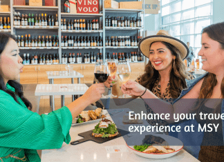 Enhance your travel experience at the New Orleans Airport, MSY. Women saying cheers at the MSY airport.