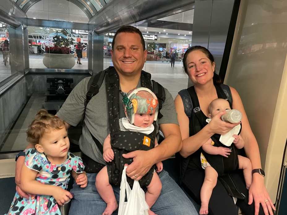 Monica Roerig Olano and her family with 3 kids under two traveling